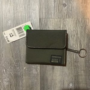Nine West new brown wallet with key ring. Compartments hold 7 cards.